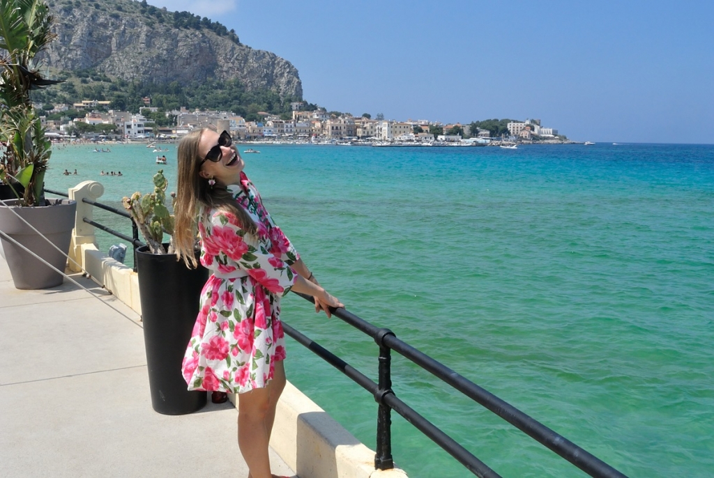 The moment of happiness from the terrace overlooking Sicily's waters